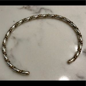 Silver bracelet with gold accents